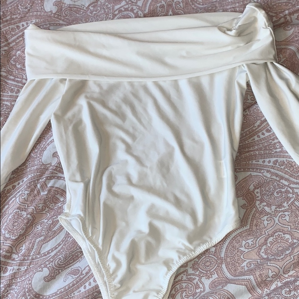 Adorable white off the shoulder bodysuit